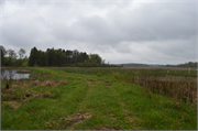 East end of Mud Lake, 0.75 mile west of Hagan Rd., a NA (unknown or not a building) dam/lock, built in Lowville, Wisconsin in 1948.