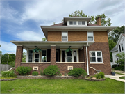 125 S MONROE ST, a American Foursquare house, built in Stoughton, Wisconsin in 1915.