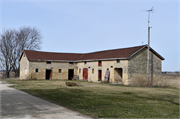 413 N. Tarrant Road , a Gabled Ell barn, built in Harmony, Wisconsin in 1861.