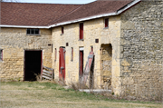 413 N. Tarrant Road , a Gabled Ell barn, built in Harmony, Wisconsin in 1861.