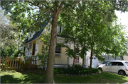 12415 W GLENDALE AVE, a Dutch Colonial Revival house, built in Butler, Wisconsin in 1924.