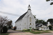207-215 S MAIN ST, a Early Gothic Revival house of worship, built in Walworth, Wisconsin in 1874.