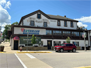 100 6TH AVENUE, a Greek Revival lodging-hotel, built in New Glarus, Wisconsin in 1853.