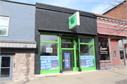 211 W Blackhawk Ave, a Commercial Vernacular small retail building, built in Prairie du Chien, Wisconsin in 1868.