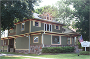 520 E WALWORTH AVE, a Colonial Revival/Georgian Revival house, built in Delavan, Wisconsin in 1906.