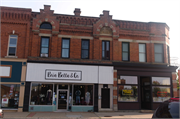 913-925 MAIN ST, a Romanesque Revival large retail building, built in Stevens Point, Wisconsin in 1885.
