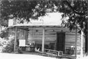 Iverson, Andreas, House and First Public School, a Building.