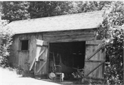 Iverson, Andreas, House and First Public School, a Building.
