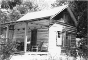 Iverson, Andreas, House and First Public School, a Building.