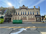 225-227 E MILL ST, a German Renaissance Revival large retail building, built in Plymouth, Wisconsin in 1889.