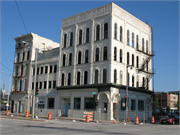 300 W JUNEAU AVE, a Commercial Vernacular large retail building, built in Milwaukee, Wisconsin in 1876.