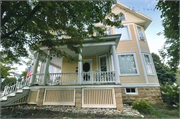 225 N MONROE ST, a Queen Anne house, built in Stoughton, Wisconsin in 1904.