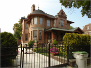 3119 W WELLS ST, a German Renaissance Revival house, built in Milwaukee, Wisconsin in 1899.