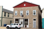 67 E Main St., a Commercial Vernacular grocery store/supermarket, built in Benton, Wisconsin in 1867.