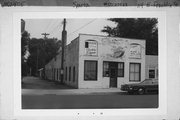114 E FRANKLIN ST, a Commercial Vernacular blacksmith shop, built in Sparta, Wisconsin in 1914.