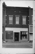 113-115 E OAK ST, a Commercial Vernacular small retail building, built in Sparta, Wisconsin in 1899.
