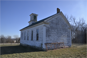 12007 County Rd K (AKA NW CORNER OF K AT MT. ZION RD), a Greek Revival house of worship, built in North Lancaster, Wisconsin in 1871.