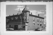 125-127 W OAK ST, a Queen Anne large retail building, built in Sparta, Wisconsin in 1896.