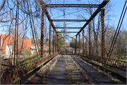 Woodford Drive over the Milwaukee River, a NA (unknown or not a building) bridge, built in Barton, Wisconsin in 1891.