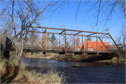 Woodford Drive over the Milwaukee River, a NA (unknown or not a building) bridge, built in Barton, Wisconsin in 1891.