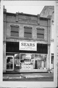 128 N WATER ST, a Neoclassical/Beaux Arts small retail building, built in Sparta, Wisconsin in 1905.