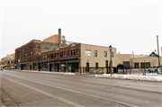 817-831 N 27TH ST, a Spanish/Mediterranean Styles large retail building, built in Milwaukee, Wisconsin in 1926.