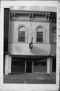 112 S WATER ST, a Italianate retail building, built in Sparta, Wisconsin in 1865.