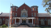 E PARK AVE, a Colonial Revival/Georgian Revival small office building, built in Chippewa Falls, Wisconsin in 1902.