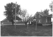 Smith, J.B., House and Granary, a Building.