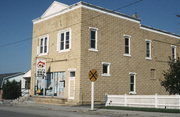 126 W MAIN ST, a Commercial Vernacular grocery store/supermarket, built in Lena, Wisconsin in 1916.