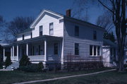 1345 MAIN ST, a Greek Revival house, built in Oconto, Wisconsin in 1851.