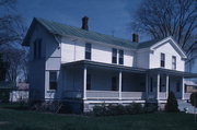 1345 MAIN ST, a Greek Revival house, built in Oconto, Wisconsin in 1851.