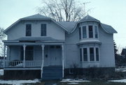 408 PARK AVE (AKA 412 PARK AVE), a Queen Anne house, built in Oconto, Wisconsin in 1865.