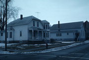 408 PARK AVE (AKA 412 PARK AVE), a Queen Anne house, built in Oconto, Wisconsin in 1865.