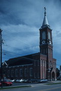 516 BRAZEAU AVE, a Romanesque Revival church, built in Oconto, Wisconsin in 1899.