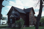 562 MAIN ST, a Front Gabled house, built in Oconto, Wisconsin in 1857.