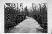 IRON BRIDGE RD, a NA (unknown or not a building) pony truss bridge, built in Mountain, Wisconsin in 1906.