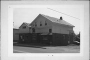 209 BRAZEAU AVE, a Greek Revival tavern/bar, built in Oconto, Wisconsin in 1875.