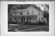 1345 MAIN ST, a Greek Revival house, built in Oconto, Wisconsin in 1851.