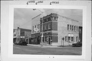 1133 MAIN STREET, a Neoclassical/Beaux Arts small office building, built in Oconto, Wisconsin in 1910.