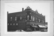 1109 W MAIN ST, a Commercial Vernacular large retail building, built in Oconto, Wisconsin in 1891.
