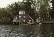 9512 COUNTRY CLUB RD ON LAKE MINOCQUA, a Queen Anne boat house, built in Minocqua, Wisconsin in 1913.