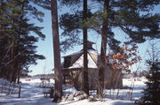 9574 COUNTRY CLUB RD, a Craftsman boat house, built in Minocqua, Wisconsin in 1930.