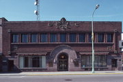 8 W DAVENPORT ST, a Prairie School bank/financial institution, built in Rhinelander, Wisconsin in 1911.