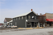 123 S MAIN ST, a Front Gabled large retail building, built in Cuba City, Wisconsin in 1894.