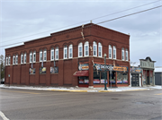 201 N Main St, a Commercial Vernacular general store, built in Shawano, Wisconsin in 1900.