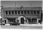 First National Bank, a Building.