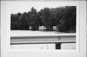 ON DEER LAKE NEAR STATE HIGHWAY 32, a Contemporary boat house, built in Three Lakes, Wisconsin in 1950.