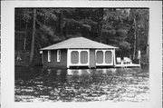LAKE TOMAHAWK, a Craftsman boat house, built in Minocqua, Wisconsin in 1915.