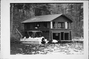 LAKE TOMAHAWK, a Rustic Style boat house, built in Minocqua, Wisconsin in 1920.